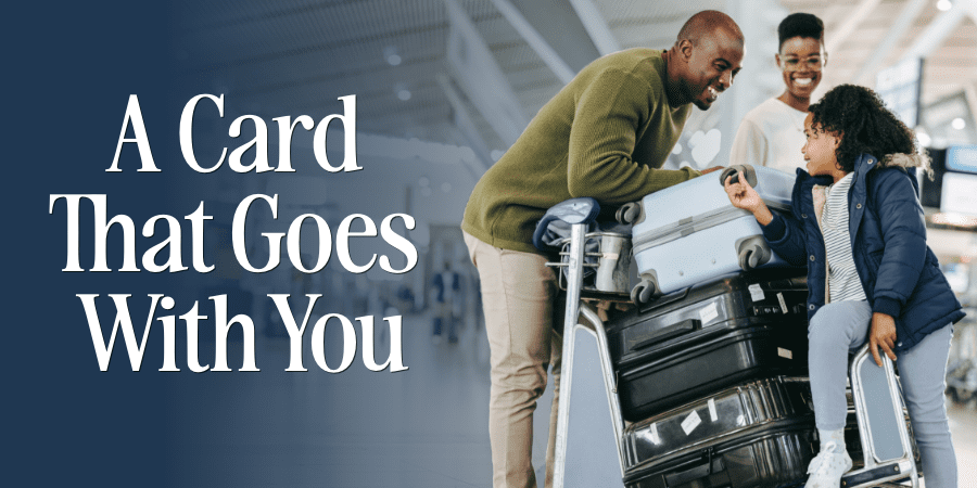 A smiling African American family with luggage at the airport. At the left, the words: A Card That Goes With You