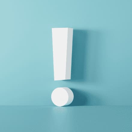 An exclamation mark with a drop shadow against a teal background.
