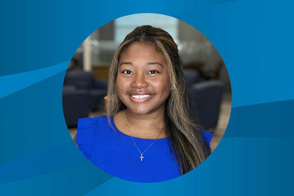 Profile of Breanna Pinkard against a patterned background.